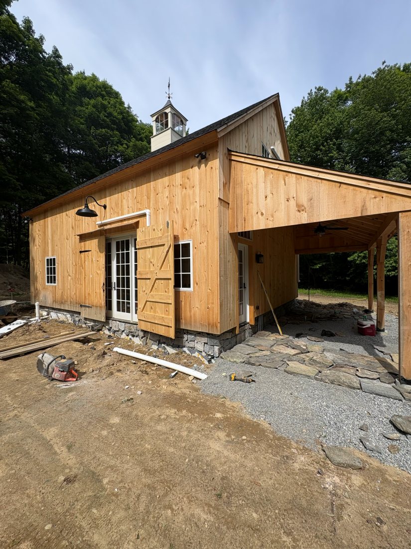 Thomas Construction reviewing project plans with a homeowner in Connecticut